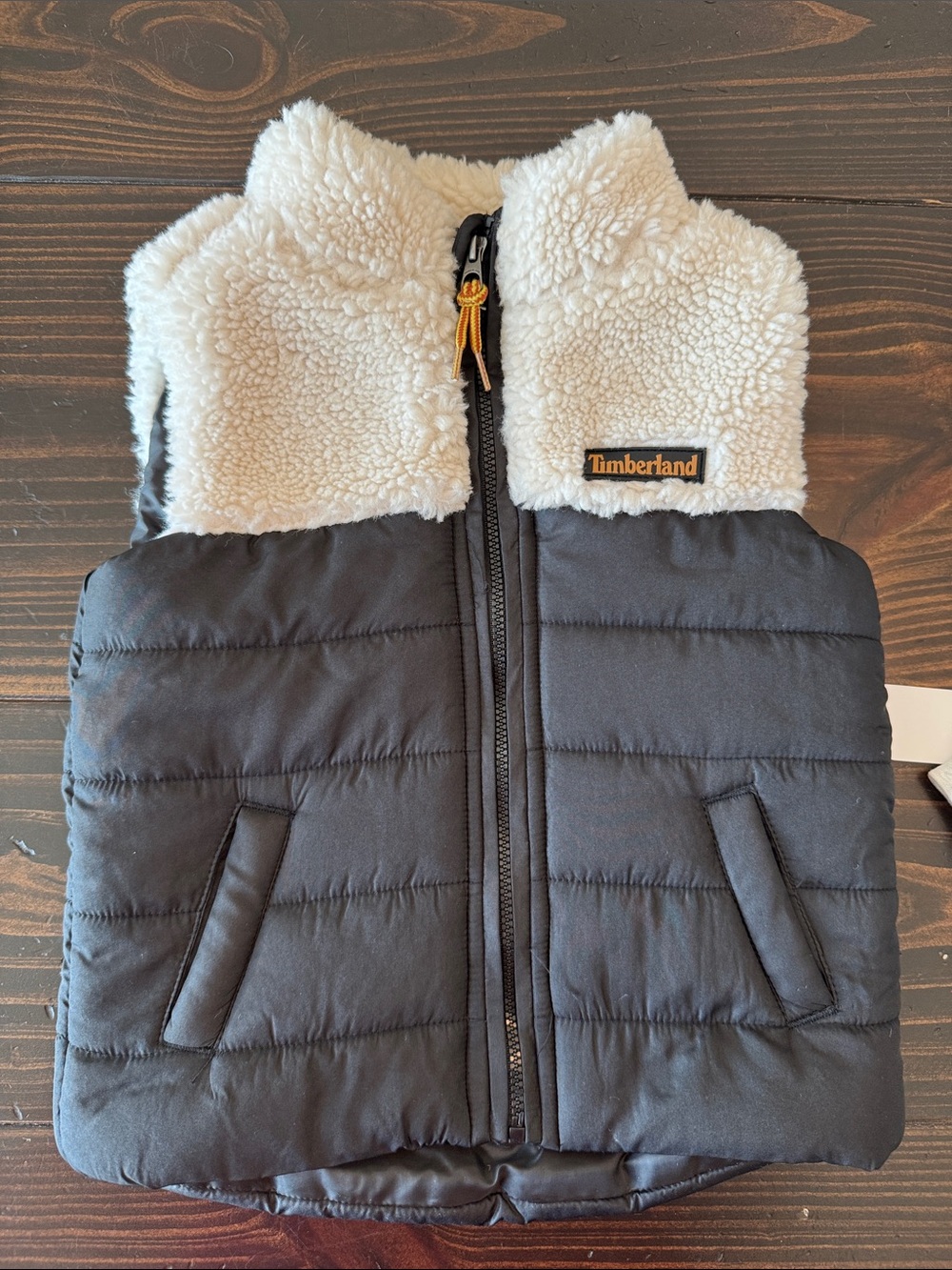 Timberland Kids Black & Cream Puffer Vest with Gray Logo Tee and Tan Joggers - Picture 2 of 8